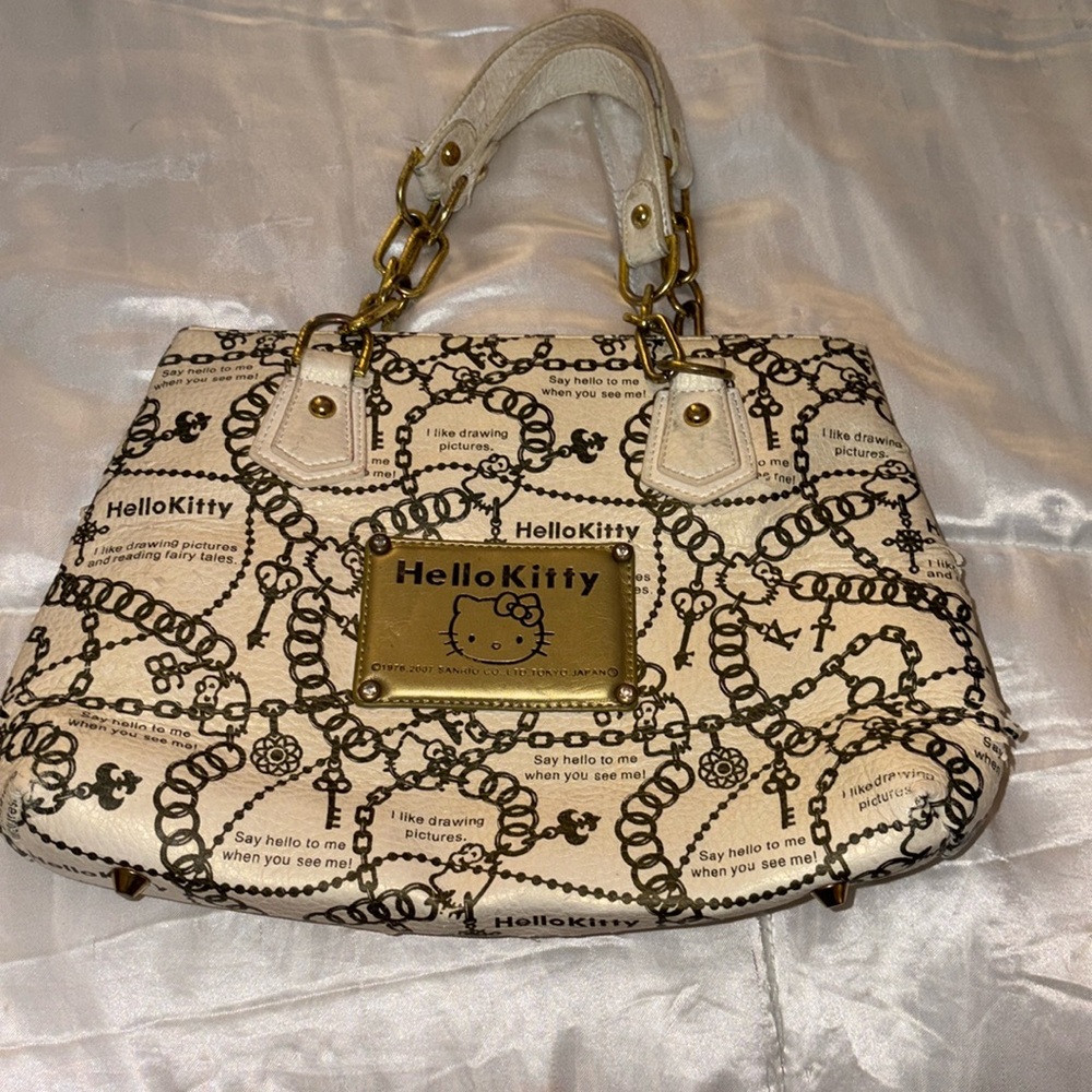 Vintage gold and brown hello Kitty handbag ￼